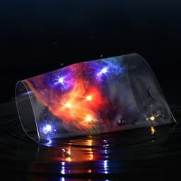 Quantum dot lasing from a waterproof and stretchable polymer film